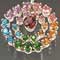 Silver, garnet, tourmaline, amethyst, blue topaz, chrome diopside, peridot, and citrine