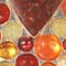 Silver, dinosaur bone, Mexican fire opal, citrine, amber, and garnet