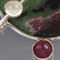 Silver, ruby zoisite, ruby, moonstone, chrome diopside, and amethyst