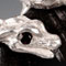 Silver, hypersthene, and spinel