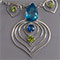 Silver, blue topaz, iolite, and peridot
