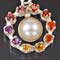 Silver, pearls, garnet, fire opal, citrine, amethyst, and tourmaline