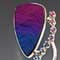 Silver, titanized jade, apatite, tourmaline, amethyst, iolite, and blue topaz