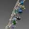 Silver, kyanite, iolite, tanzanite, apatite, aquamarine, chrome diopside, and peridot