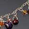 Silver, garnet, citrine,  tourmaline, amethyst, carnelian, sapphire, heliodor, and spinel